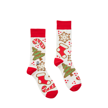 Pair of Christmas-themed socks with red cuffs on a white background